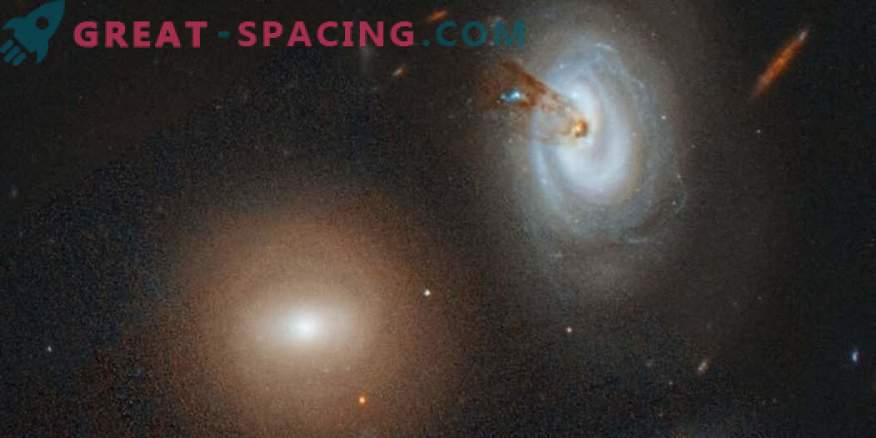 Het hongerige cluster absorbeert een weerloos sterrenstelsel