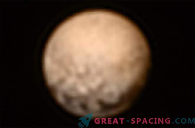 Het nieuw leven ingeblazen schip van de missie New Horizons stuurt een foto van Pluto
